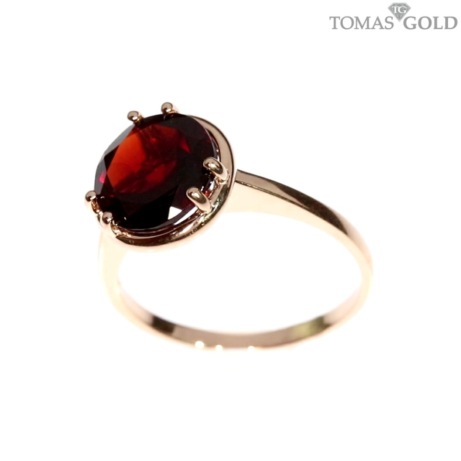 Gold ring with garnet